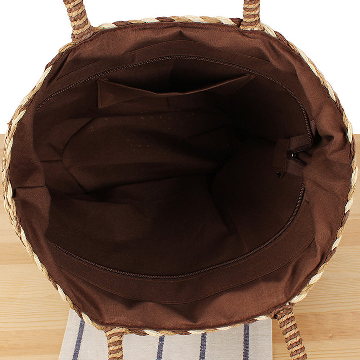 Modern basket bag with decorative pom poms Skanto