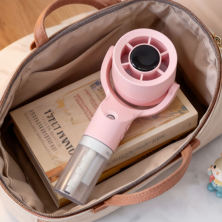 Dame Bærbar spray-håndvifte med USB-ladefunksjon og ergonomisk design Skanto