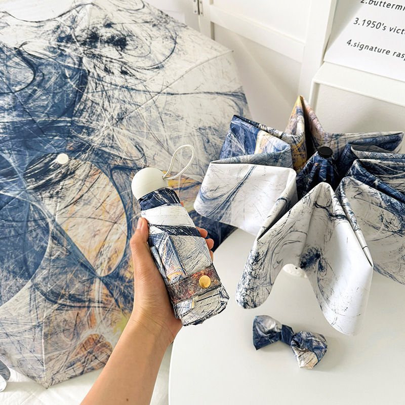Dame sammenleggbart paraply med kunstnerisk design og automatisk åpne mekanisme Skanto