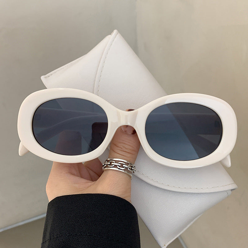 Women's Fashionable Sunglasses in Elegant Oval Design with Robust Frame Skanto
