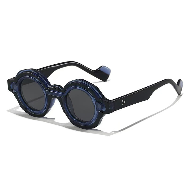 Damer moterik solbrille med unikt runddesign Skanto