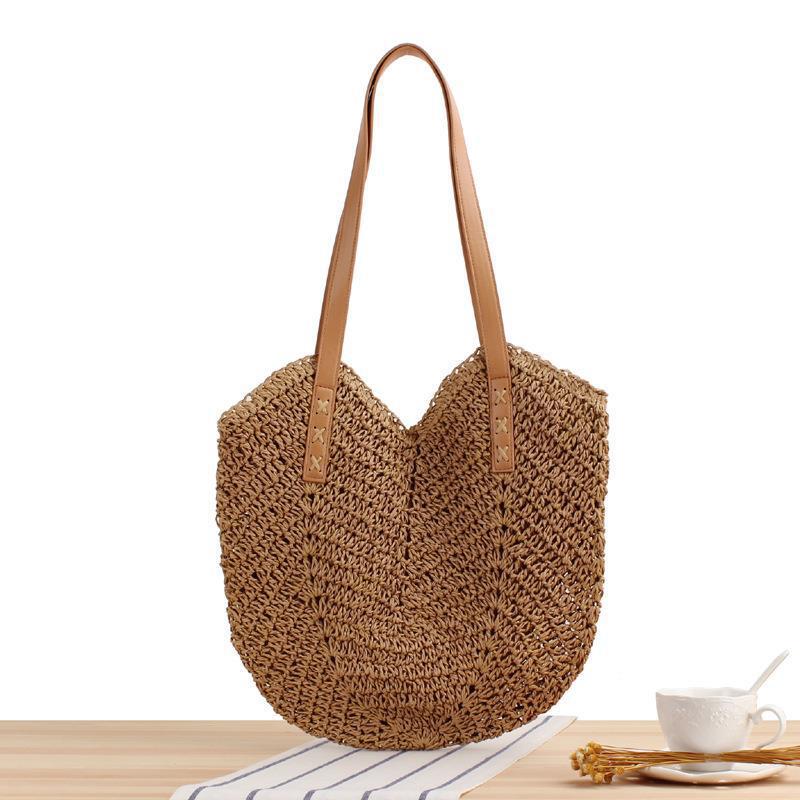 Large straw bag with leather accents Skanto