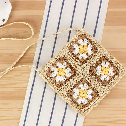Hand-knotted shoulder bag in floral design Skanto