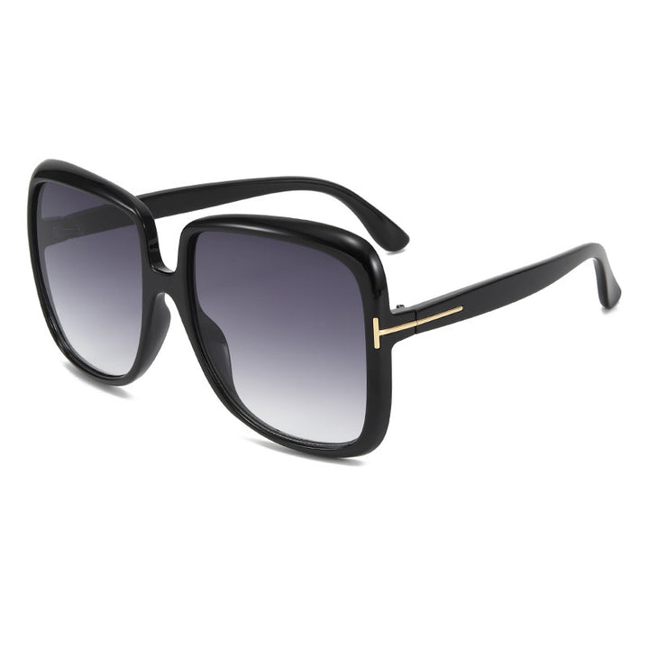 Dame elegant oversized solbrille med filigranramme Skanto