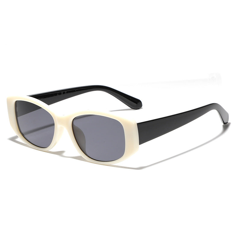 Dame moteriktig katteøye-solbrille med holografisk design Skanto