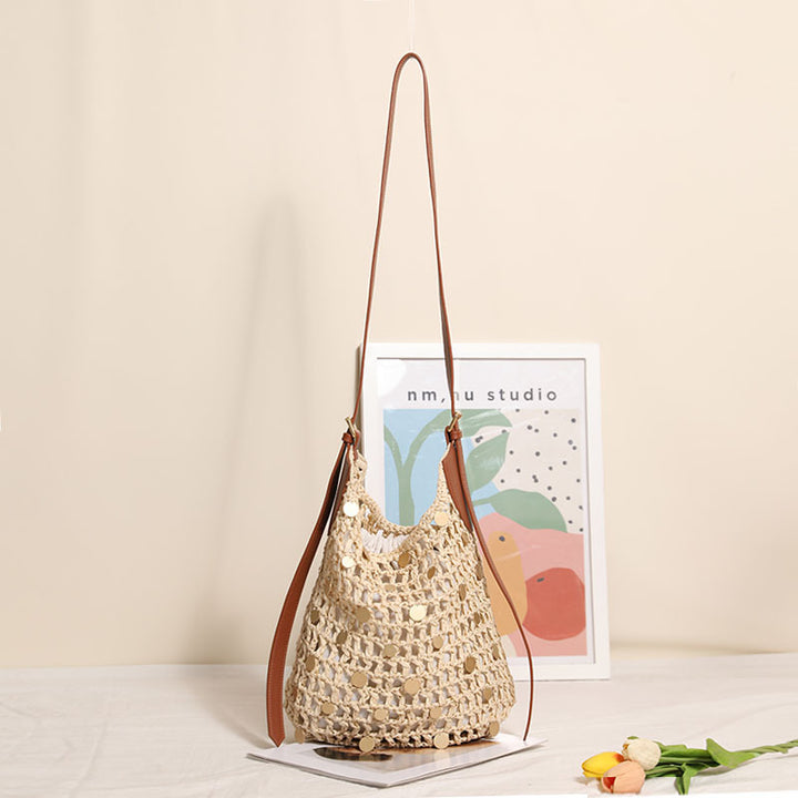 Hand-knotted shoulder bag with metal details Skanto