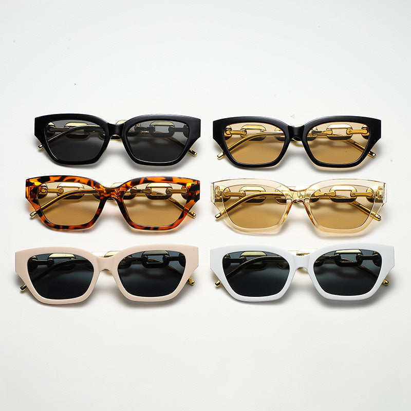 Dame solbrille med unikt kjededesign Skanto