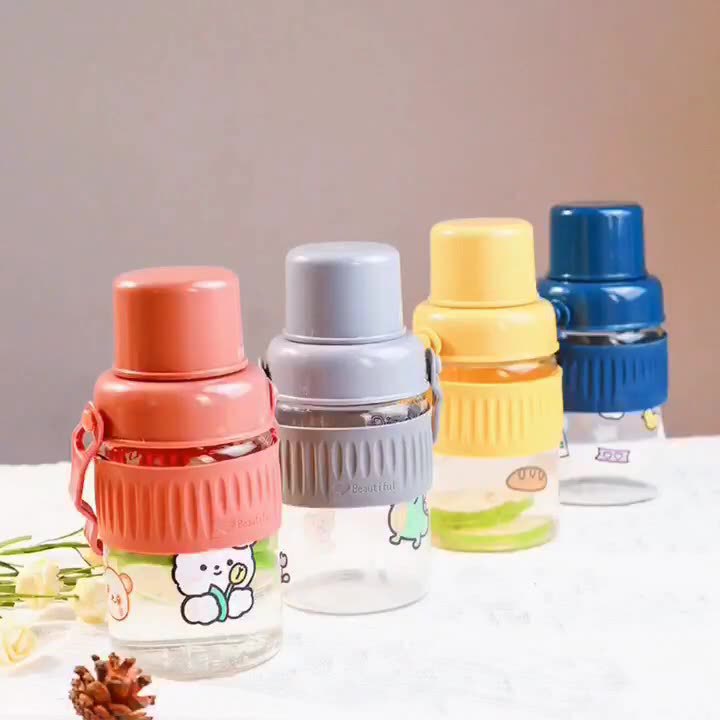 Dame trendy glassdrikkeflaske med praktisk silikonbeskyttelse Skanto