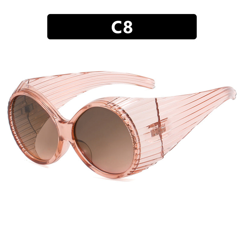 Women's extravagant sunglasses with curved frame Skanto