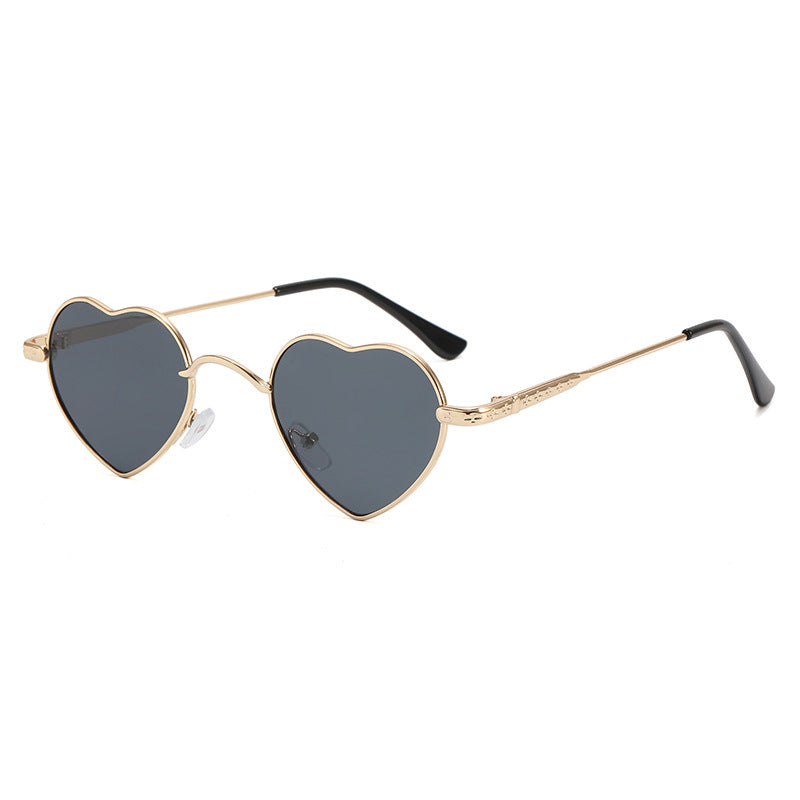 Damer hjerteformet solbrille med filigran metallramme Skanto