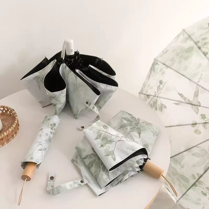 Damer Faltparaply med botanisk trykkdesign Skanto
