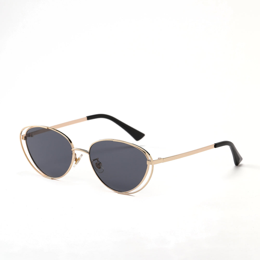 Dame geometrisk solbrille med rødt glass og elegant metallramme Skanto