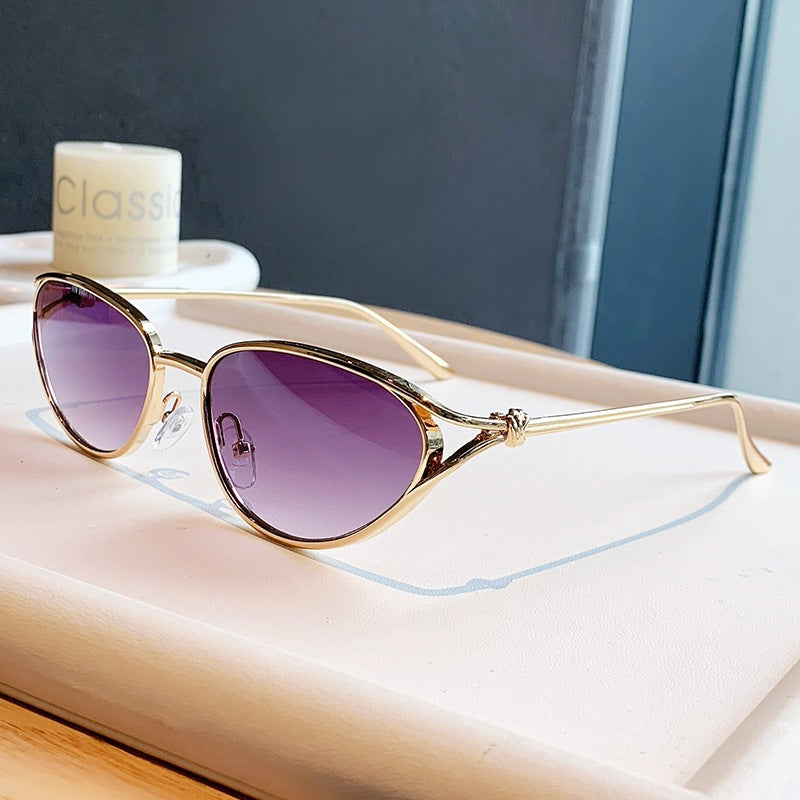 Dame Cat-Eye solbriller med elegant gullramme og polarisert glass Skanto