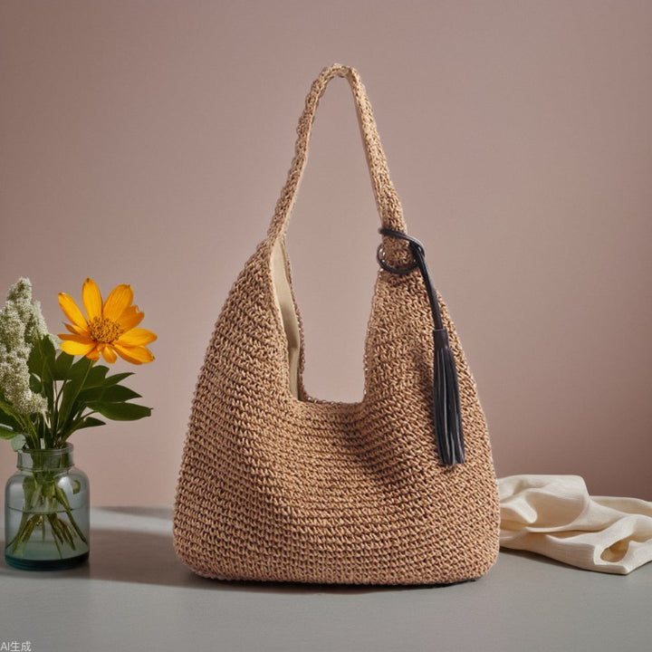 Handmade and stylish shoulder bag with decorative tassel detail Skanto