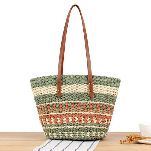Tote bag made of woven natural material with elegant leather handles Skanto