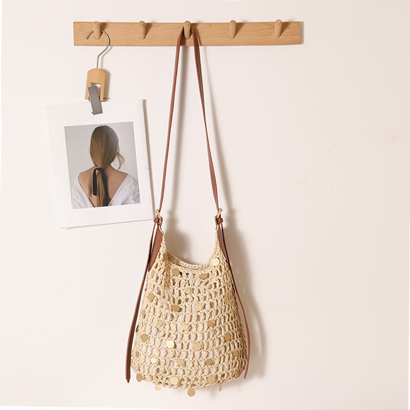 Hand-knotted shoulder bag with metal details Skanto