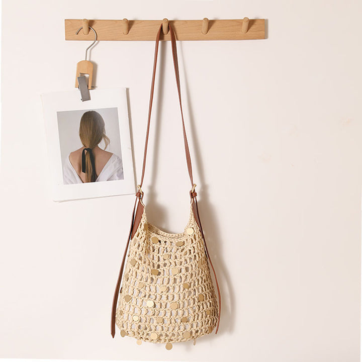 Hand-knotted shoulder bag with metal details Skanto