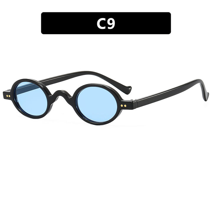 Dame rund solbrille med markant design og høykvalitets plastikkramme Skanto