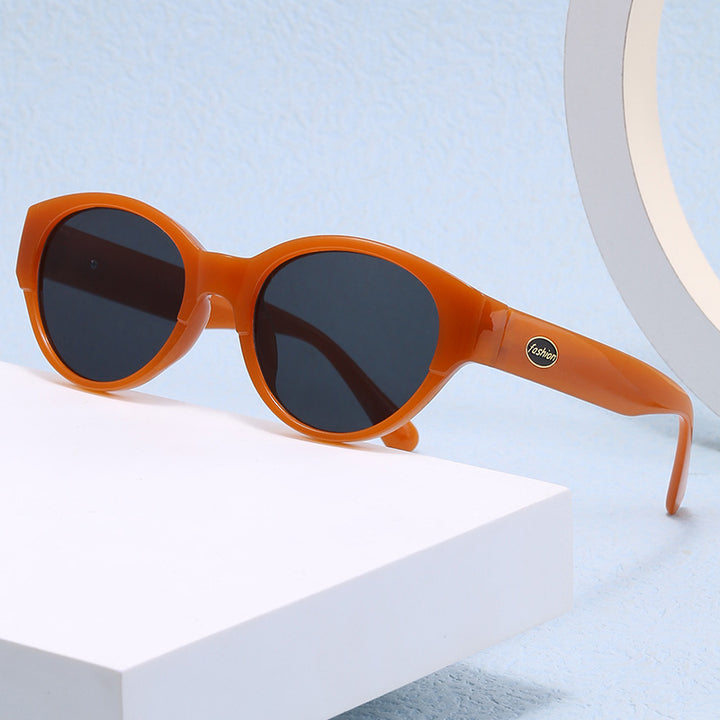 Dame Cat-Eye solbriller med eksotisk design og robust ramme Skanto