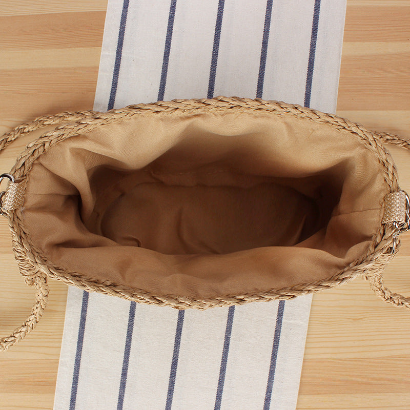 Handbag made of hand-woven natural material with bead decoration Skanto