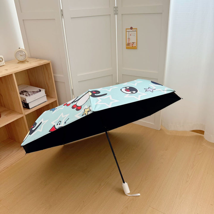 Dame sammenleggbar paraply med leken pingvin-design Skanto