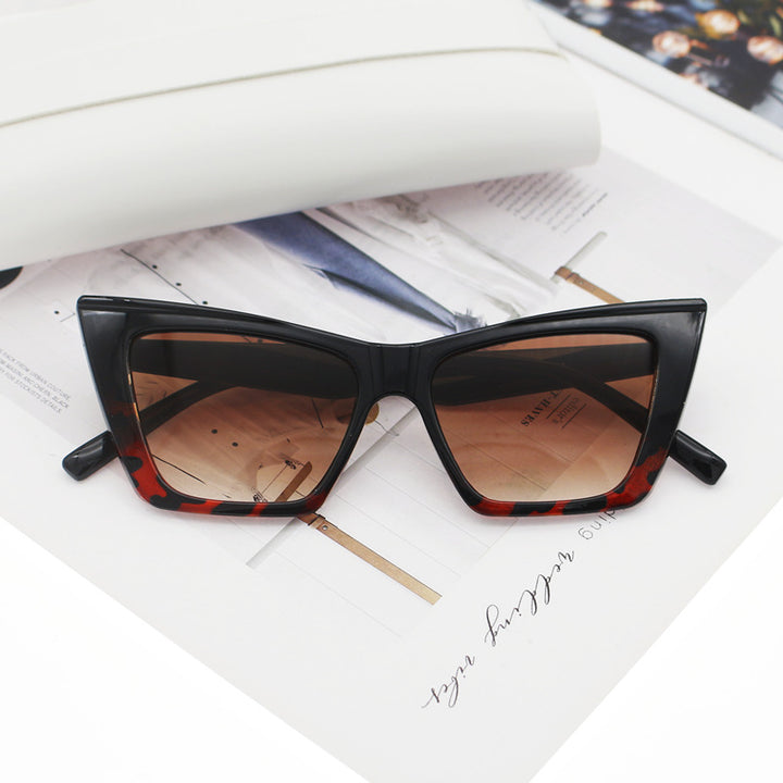 Dame katteøye-solbriller med transparent ramme og UV-beskyttelse Skanto
