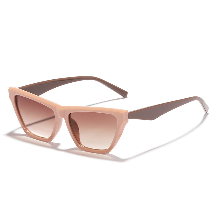 Dame designer solbrille med stilfull transparent ramme og UV-beskyttelse Skanto