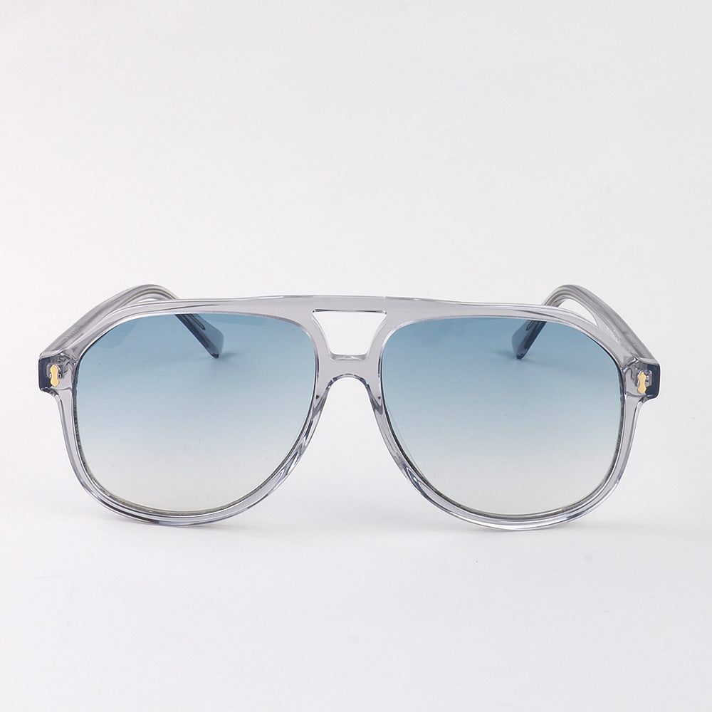 Dame moderne solbrille med innovativ ramme Skanto