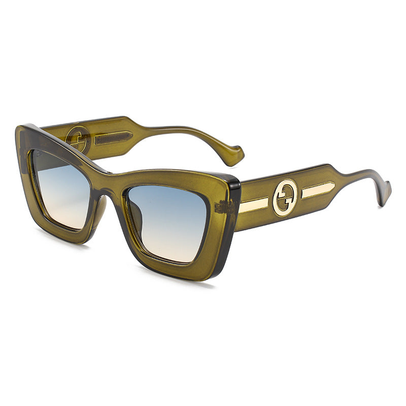 Dame designer solbrille med markant geometrisk ramme og høy kvalitet utførelse Skanto