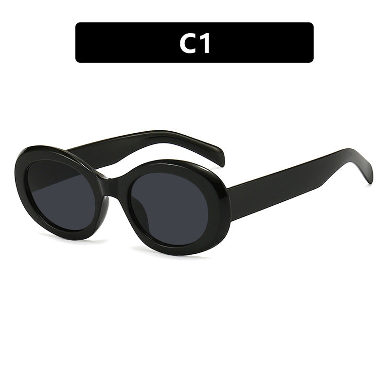 Women's fashionable sunglasses in original oval design with transparent frame and UV protection Skanto