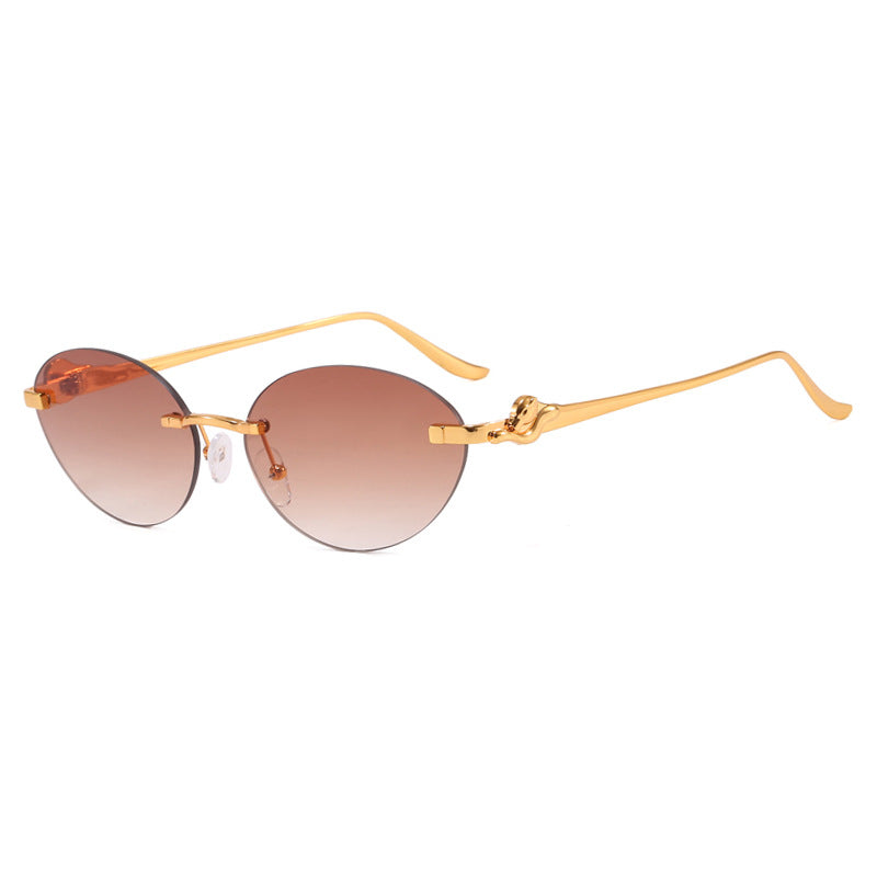 Women's round sunglasses with elegant, semi-transparent frame and stylish details Skanto