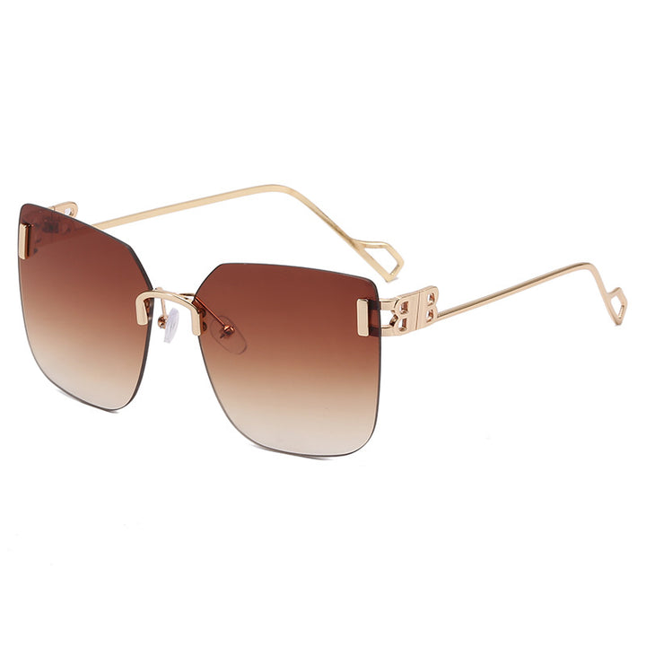 Dame elegant firkantet solbrille med gullfarget metalramme Skanto