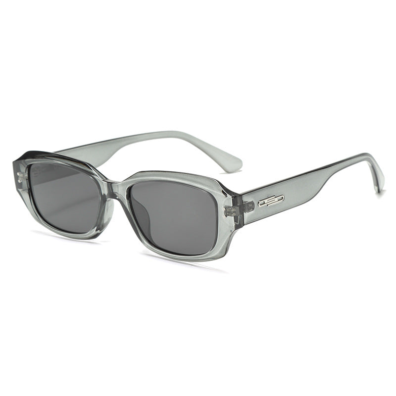 Dame trendy firkantet solbrille med innovativ gjennomsiktig ramme Skanto