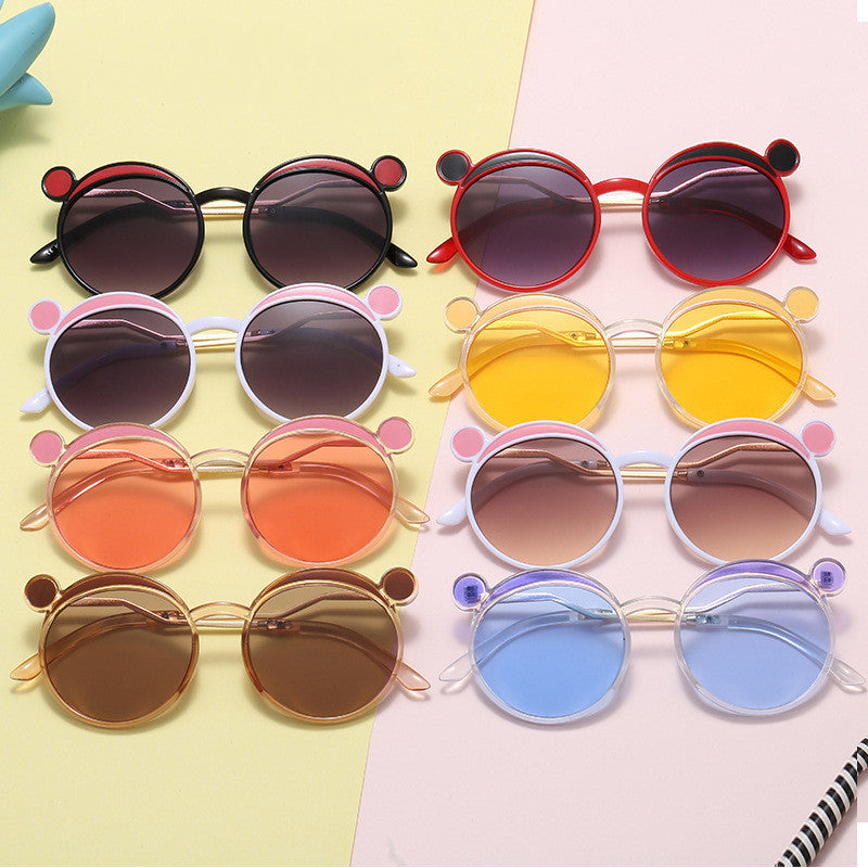Dame Fashion-runde solbrille med innovativ ramme og fargede linser Skanto