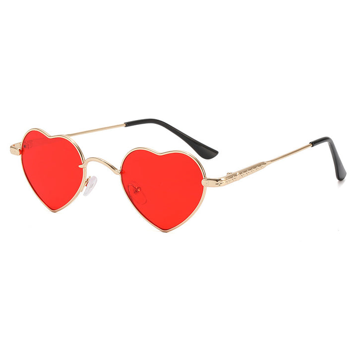 Damer hjerteformet solbrille med filigran metallramme Skanto