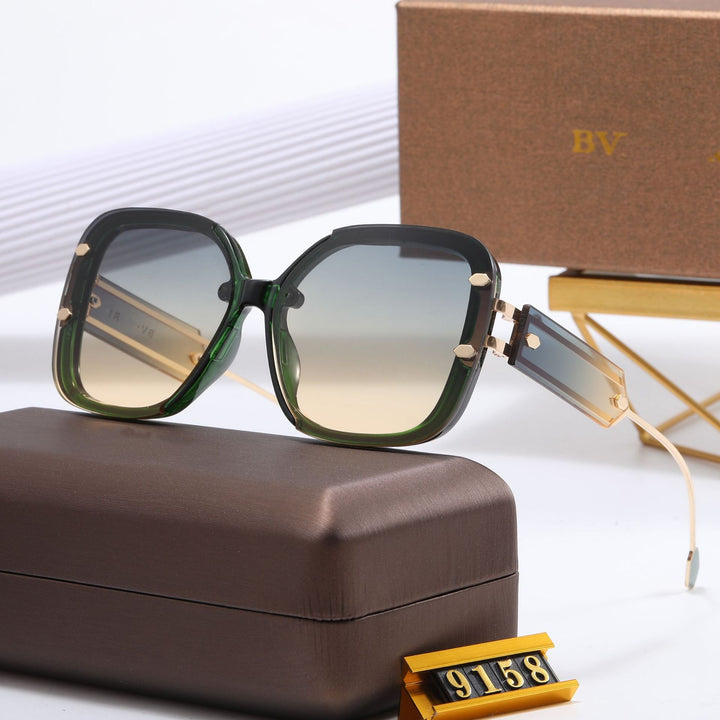 Dame designer-solbrille med ekstravagant ramme Skanto