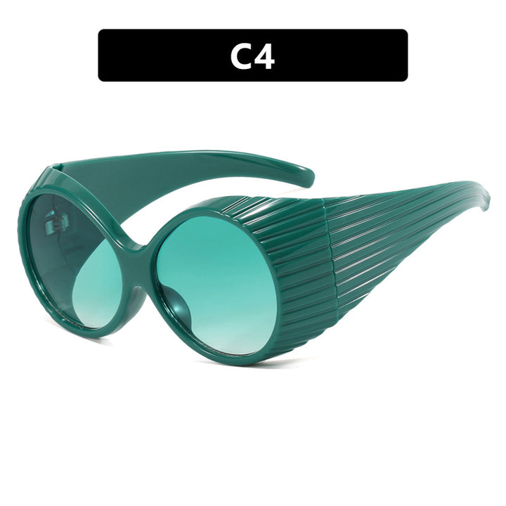 Women's extravagant sunglasses with curved frame Skanto