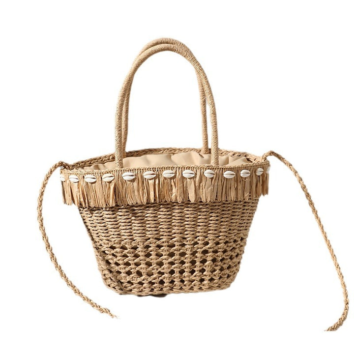 Braided straw bag with decorative tassel detail Skanto