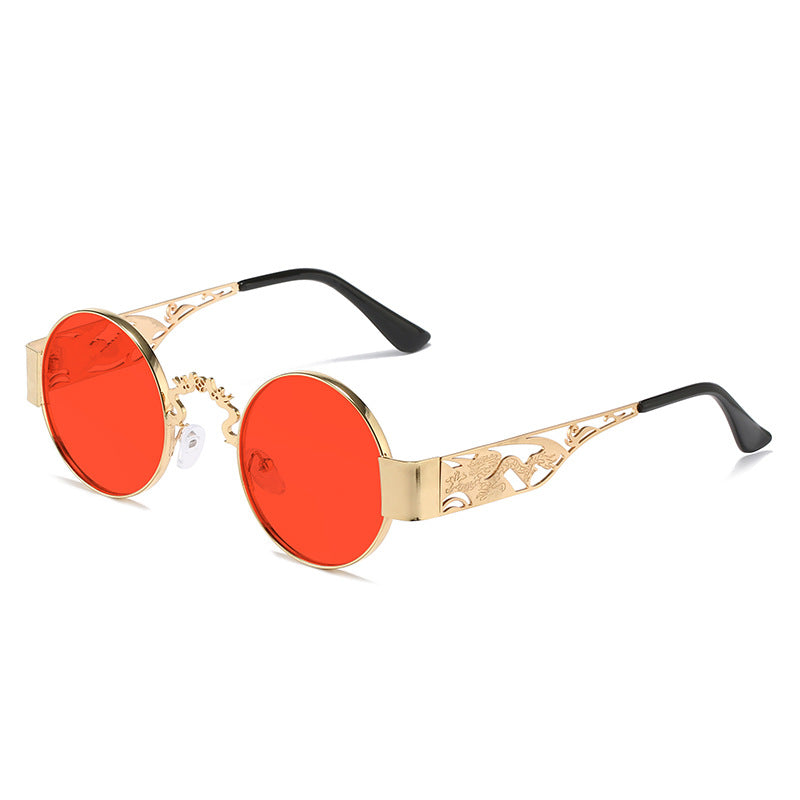 Dame kunstnerisk rundt solbrille med elegant filigranramme Skanto
