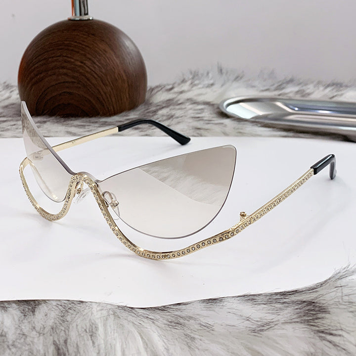 Women's extravagant shaped Cat-Eye sunglasses with sparkling applications Skanto