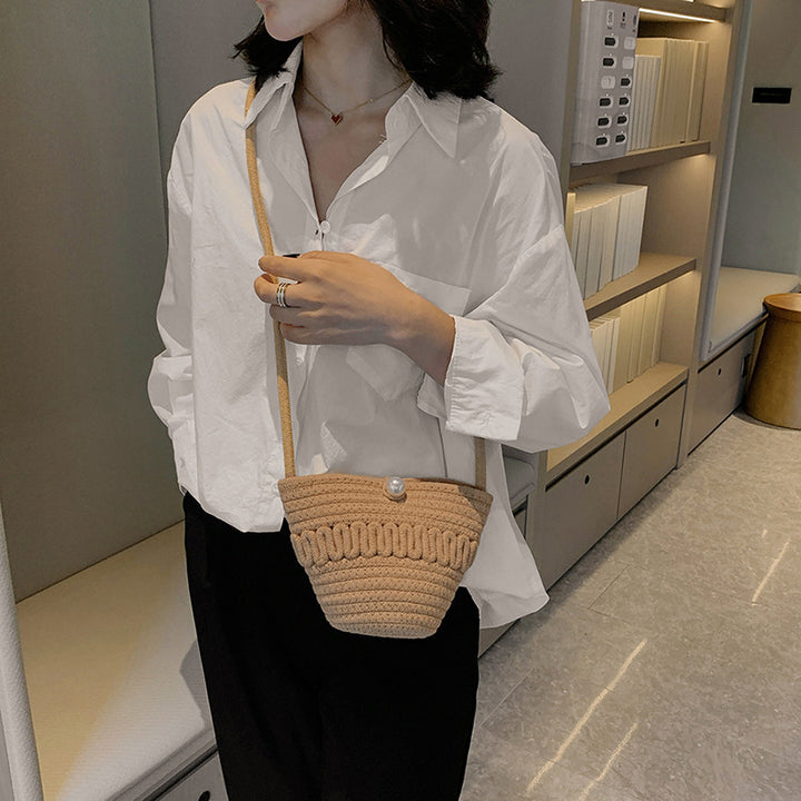 Playful handbag made of braided material Skanto