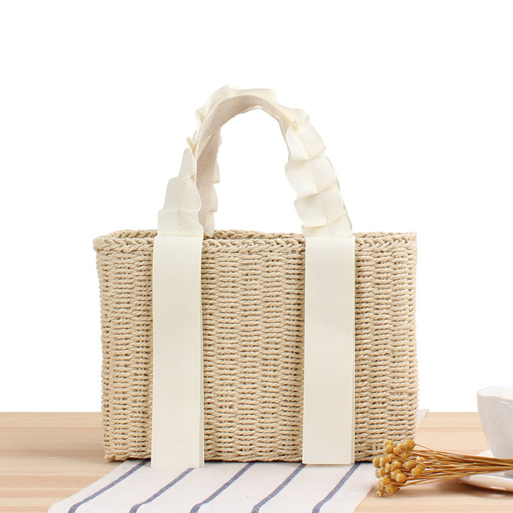 Playful basket bag with elegant fabric handle Skanto