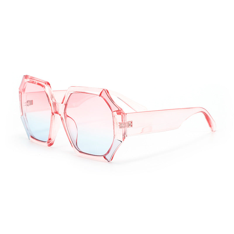 Dame moterelatert solbrille med fasettert ramme Skanto