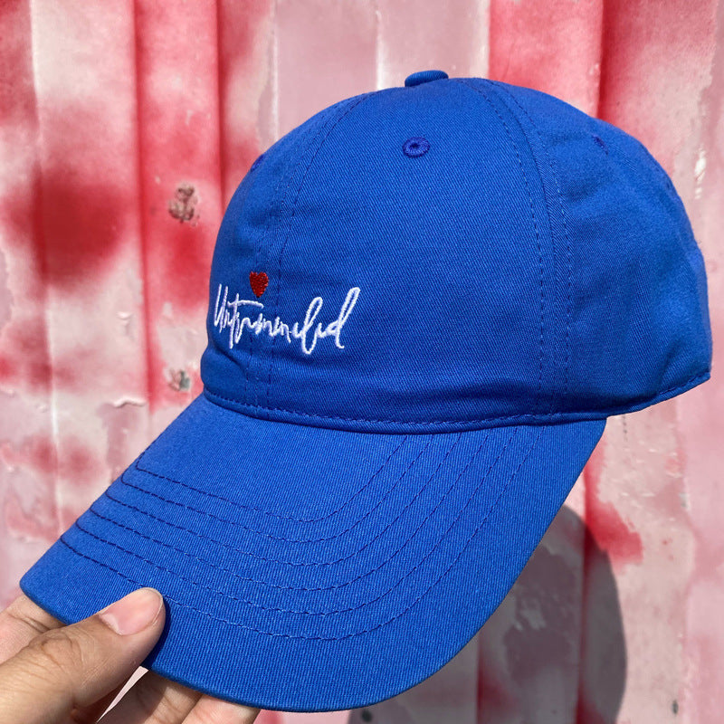 Kvinnenes broderte justerbare caps Skanto