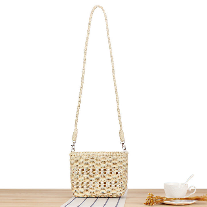 Handbag made of hand-woven natural material with bead decoration Skanto