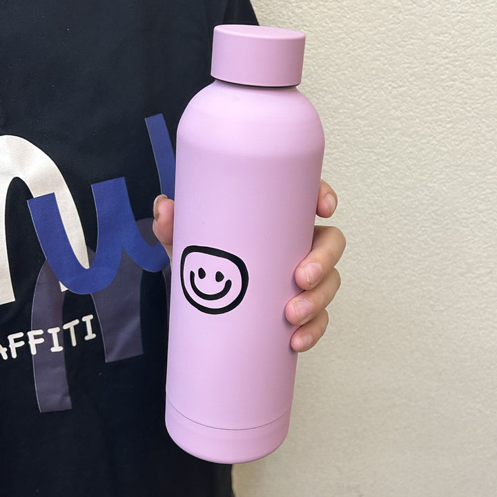 Dame isolasjonsflaske med glad smiley-design Skanto