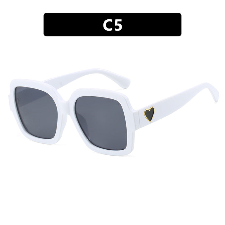 Dame firkantet solbrille med leken hjerte detalj Skanto