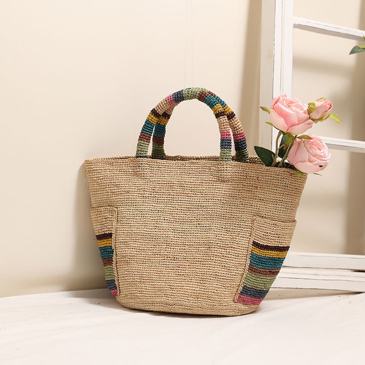 Handmade basket bag with colorful stripe accents Skanto