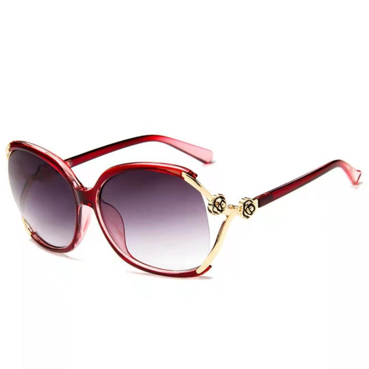 Dame elegante oversized solbrille med gyldne aksenter Skanto
