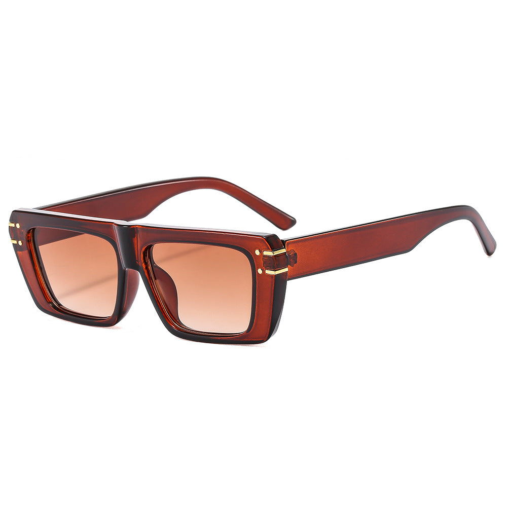 Dame moteriktig kvadratisk solbrille med glitrende akenter Skanto